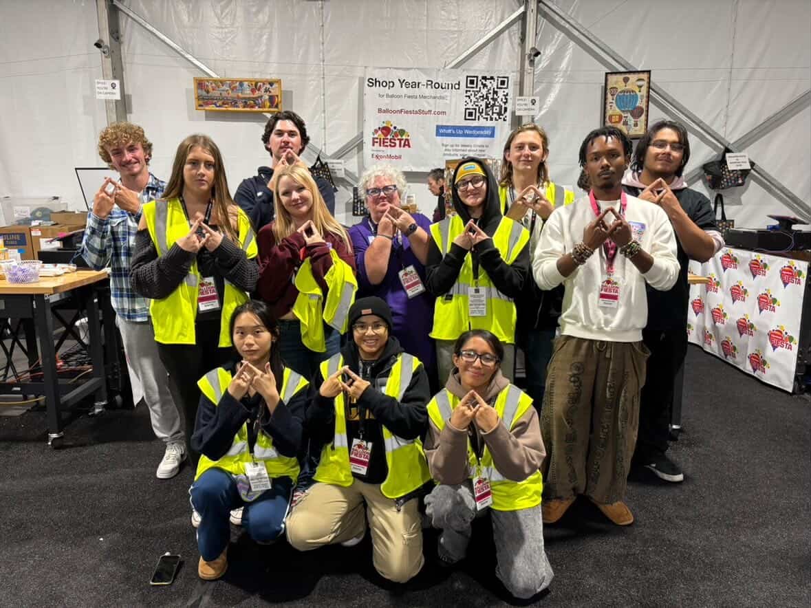 Manzano DECA members in safety vests volunteering at the Albuquerque International Balloon Fiesta